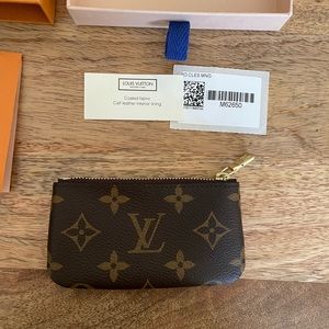 Louis Vuitton Key Pouch in Monogram. Purchased at Saks.